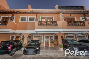 Casa em Condomínio à venda com 154m², 3 dormitórios, 1 suíte, 2 vagas, no bairro Tristeza em Porto Alegre