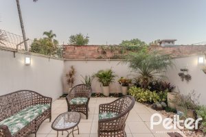 Casa em Condomínio à venda com 154m², 3 dormitórios, 1 suíte, 2 vagas, no bairro Tristeza em Porto Alegre