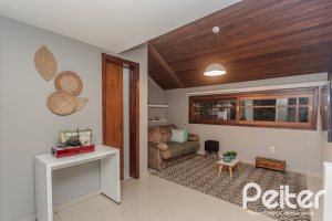 Casa em Condomínio à venda com 154m², 3 dormitórios, 1 suíte, 2 vagas, no bairro Tristeza em Porto Alegre