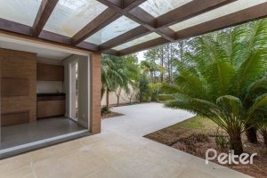 Casa em Condomínio à venda com 243m², 3 dormitórios, 3 suítes, 4 vagas, no bairro Terra Ville em PORTO ALEGRE