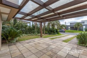 Casa em Condomínio à venda com 243m², 3 dormitórios, 3 suítes, 4 vagas, no bairro Terra Ville em PORTO ALEGRE