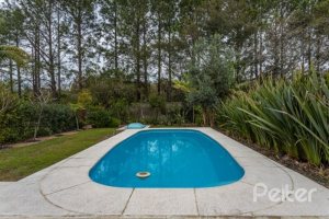 Casa em Condomínio à venda com 243m², 3 dormitórios, 3 suítes, 4 vagas, no bairro Terra Ville em PORTO ALEGRE
