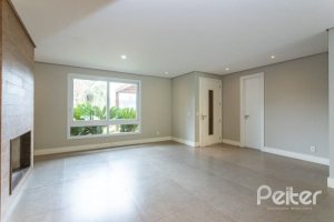 Casa em Condomínio à venda com 243m², 3 dormitórios, 3 suítes, 4 vagas, no bairro Terra Ville em PORTO ALEGRE