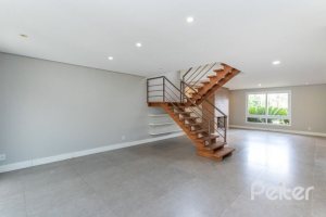 Casa em Condomínio à venda com 243m², 3 dormitórios, 3 suítes, 4 vagas, no bairro Terra Ville em PORTO ALEGRE