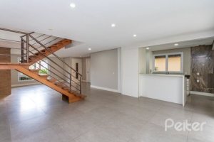Casa em Condomínio à venda com 243m², 3 dormitórios, 3 suítes, 4 vagas, no bairro Terra Ville em PORTO ALEGRE