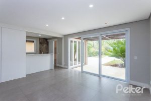 Casa em Condomínio à venda com 243m², 3 dormitórios, 3 suítes, 4 vagas, no bairro Terra Ville em PORTO ALEGRE