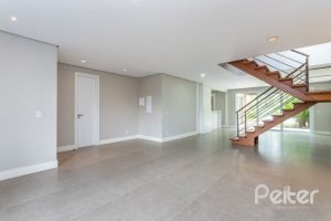 Casa em Condomínio à venda com 243m², 3 dormitórios, 3 suítes, 4 vagas, no bairro Terra Ville em PORTO ALEGRE