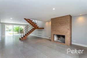 Casa em Condomínio à venda com 243m², 3 dormitórios, 3 suítes, 4 vagas, no bairro Terra Ville em PORTO ALEGRE