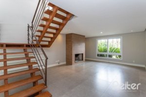 Casa em Condomínio à venda com 243m², 3 dormitórios, 3 suítes, 4 vagas, no bairro Terra Ville em PORTO ALEGRE
