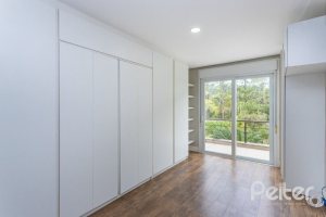 Casa em Condomínio à venda com 243m², 3 dormitórios, 3 suítes, 4 vagas, no bairro Terra Ville em PORTO ALEGRE