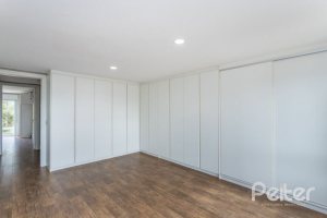 Casa em Condomínio à venda com 243m², 3 dormitórios, 3 suítes, 4 vagas, no bairro Terra Ville em PORTO ALEGRE