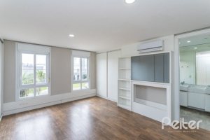 Casa em Condomínio à venda com 243m², 3 dormitórios, 3 suítes, 4 vagas, no bairro Terra Ville em PORTO ALEGRE