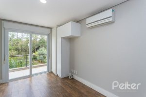 Casa em Condomínio à venda com 243m², 3 dormitórios, 3 suítes, 4 vagas, no bairro Terra Ville em PORTO ALEGRE