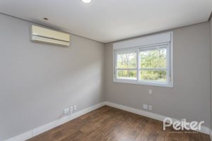 Casa em Condomínio à venda com 243m², 3 dormitórios, 3 suítes, 4 vagas, no bairro Terra Ville em PORTO ALEGRE
