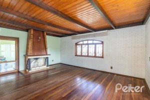Casa à venda com 263m², 3 dormitórios, 2 suítes, 2 vagas, no bairro Jardim Isabel em Porto Alegre
