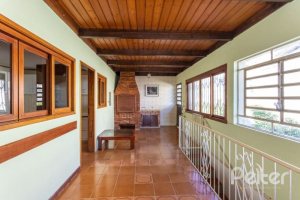 Casa à venda com 263m², 3 dormitórios, 2 suítes, 2 vagas, no bairro Jardim Isabel em Porto Alegre