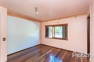 Casa à venda com 263m², 3 dormitórios, 2 suítes, 2 vagas, no bairro Jardim Isabel em Porto Alegre