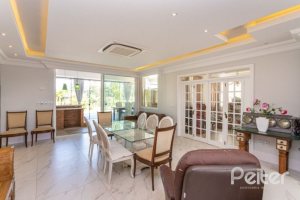 Casa em Condomínio à venda com 550m², 4 dormitórios, 4 suítes, 6 vagas, no bairro Terra Ville em Porto Alegre