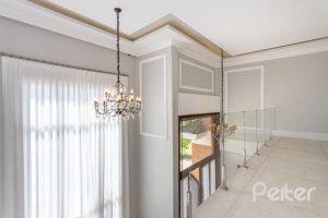 Casa em Condomínio à venda com 550m², 4 dormitórios, 4 suítes, 6 vagas, no bairro Terra Ville em Porto Alegre