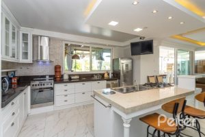 Casa em Condomínio à venda com 550m², 4 dormitórios, 4 suítes, 6 vagas, no bairro Terra Ville em Porto Alegre