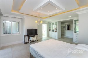 Casa em Condomínio à venda com 550m², 4 dormitórios, 4 suítes, 6 vagas, no bairro Terra Ville em Porto Alegre