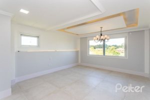 Casa em Condomínio à venda com 550m², 4 dormitórios, 4 suítes, 6 vagas, no bairro Terra Ville em Porto Alegre