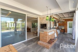 Casa em Condomínio à venda com 550m², 4 dormitórios, 4 suítes, 6 vagas, no bairro Terra Ville em Porto Alegre