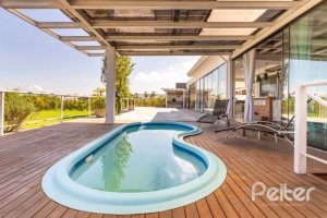 Casa em Condomínio à venda com 550m², 4 dormitórios, 4 suítes, 6 vagas, no bairro Terra Ville em Porto Alegre