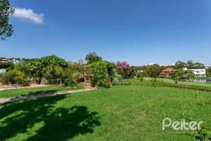 Casa em Condomínio à venda com 550m², 4 dormitórios, 4 suítes, 6 vagas, no bairro Terra Ville em Porto Alegre