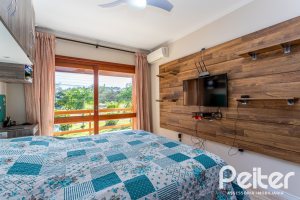 Casa à venda com 145m², 3 dormitórios, 1 suíte, 2 vagas, no bairro Hípica em Porto Alegre