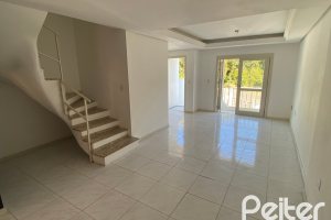 Casa à venda com 223m², 3 dormitórios, 1 suíte, 3 vagas, no bairro Guarujá em Porto Alegre