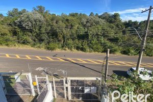 Casa à venda com 223m², 3 dormitórios, 1 suíte, 3 vagas, no bairro Guarujá em Porto Alegre