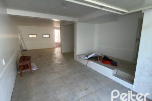 Casa à venda com 223m², 3 dormitórios, 1 suíte, 3 vagas, no bairro Guarujá em Porto Alegre