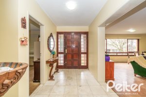 Casa à venda com 349m², 3 dormitórios, 1 suíte, 4 vagas, no bairro Vila Assunção em Porto Alegre