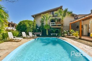 Casa em Condomínio à venda com 185m², 3 dormitórios, 1 suíte, 3 vagas, no bairro Tristeza em Porto Alegre