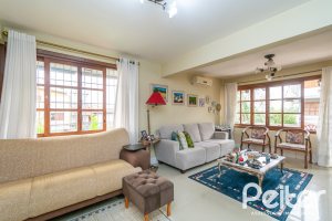 Casa em Condomínio à venda com 185m², 3 dormitórios, 1 suíte, 3 vagas, no bairro Tristeza em Porto Alegre