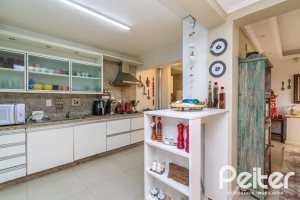 Casa em Condomínio à venda com 185m², 3 dormitórios, 1 suíte, 3 vagas, no bairro Tristeza em Porto Alegre