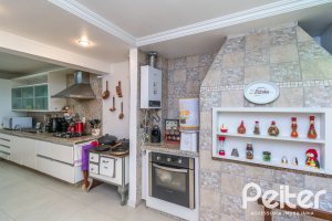 Casa em Condomínio à venda com 185m², 3 dormitórios, 1 suíte, 3 vagas, no bairro Tristeza em Porto Alegre