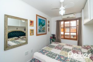 Casa em Condomínio à venda com 185m², 3 dormitórios, 1 suíte, 3 vagas, no bairro Tristeza em Porto Alegre