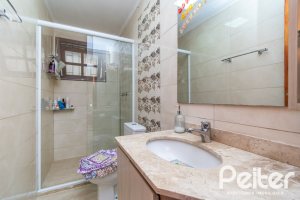 Casa em Condomínio à venda com 185m², 3 dormitórios, 1 suíte, 3 vagas, no bairro Tristeza em Porto Alegre