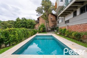 Casa à venda com 463m², 5 dormitórios, 1 suíte, 6 vagas, no bairro Vila Conceição em Porto Alegre