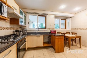 Casa em Condomínio à venda com 313m², 3 dormitórios, 1 suíte, 2 vagas, no bairro Tristeza em PORTO ALEGRE