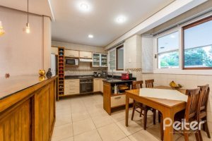 Casa em Condomínio à venda com 313m², 3 dormitórios, 1 suíte, 2 vagas, no bairro Tristeza em PORTO ALEGRE