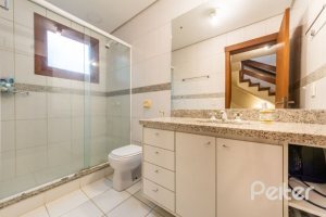 Casa em Condomínio à venda com 313m², 3 dormitórios, 1 suíte, 2 vagas, no bairro Tristeza em PORTO ALEGRE