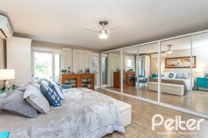 Casa em Condomínio à venda com 366m², 4 dormitórios, 4 suítes, 3 vagas, no bairro Terra Ville em PORTO ALEGRE