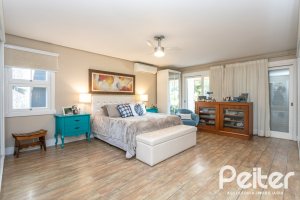 Casa em Condomínio à venda com 366m², 4 dormitórios, 4 suítes, 3 vagas, no bairro Terra Ville em PORTO ALEGRE