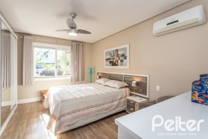 Casa em Condomínio à venda com 366m², 4 dormitórios, 4 suítes, 3 vagas, no bairro Terra Ville em PORTO ALEGRE