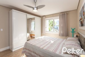 Casa em Condomínio à venda com 366m², 4 dormitórios, 4 suítes, 3 vagas, no bairro Terra Ville em PORTO ALEGRE