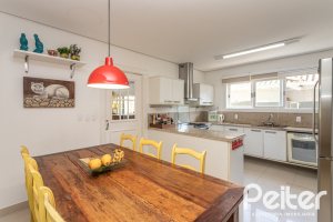 Casa em Condomínio à venda com 366m², 4 dormitórios, 4 suítes, 3 vagas, no bairro Terra Ville em PORTO ALEGRE