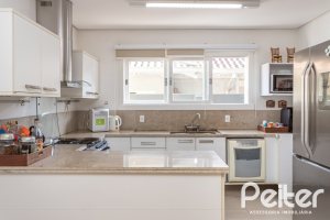 Casa em Condomínio à venda com 366m², 4 dormitórios, 4 suítes, 3 vagas, no bairro Terra Ville em PORTO ALEGRE